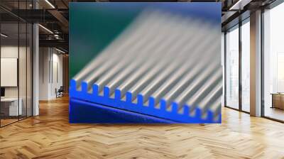 Close up view on cooling radiator of CPU chip in blue glow Wall mural