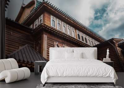 The ancient wooden palace aspires in blue heaven Wall mural