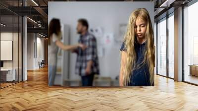 Girl listening parents quarreling, childhood trauma, mental abuse, hotline Wall mural