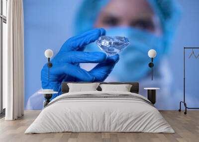 Scientist examining crystal, expert evaluation of precious stone, diamond mining Wall mural