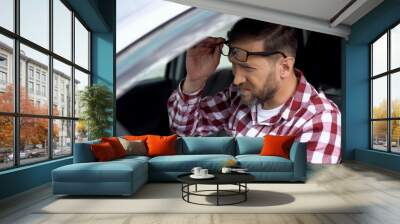 Tired driver taking eyeglasses off, eyesight disease, health weakness, health Wall mural