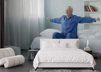 Waking up full of energy cheerful pensioner doing morning gymnastics, new day Wall mural