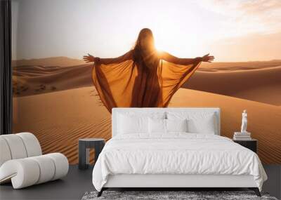 Woman wearing hijab walking in the desert sand dunes at sunset - Happy traveler with arms up enjoying freedom outside - Wanderlust, wellbeing, happiness and travel concept Wall mural