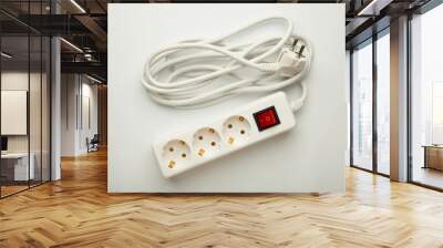 Electric white portable socket on white background. Top view Wall mural