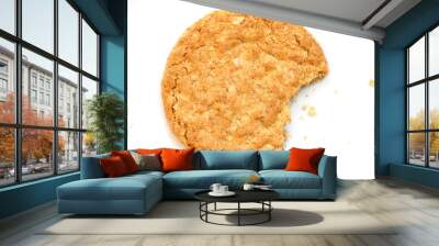 Single golden oat biscuit with a bite missing. Shot from above Wall mural