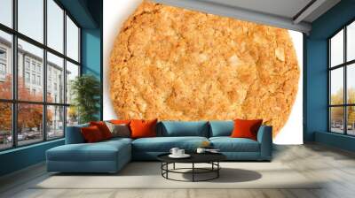 Single whole golden oat biscuit. Shot from above. Wall mural