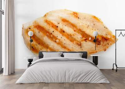 Whole grilled chicken breast with grill marks and ground black pepper isolated on white. Top view. Wall mural