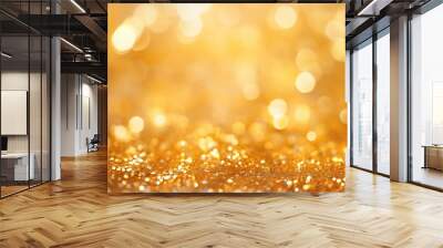 Abstract golden background with bokeh effect and shining defocused glitters. Festive gold texture for Christmas, New Year, birthday, celebration, greeting, victory, success, magic party. Wall mural