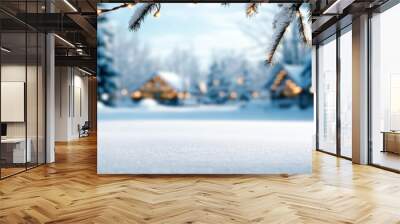 A serene winter landscape with snow-covered ground, frosty trees, and glowing lights illuminating cozy cabins in the background. Wall mural