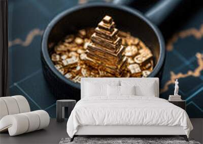 magnifying glass reveals gold bars and coins, symbolizing investment growth Wall mural