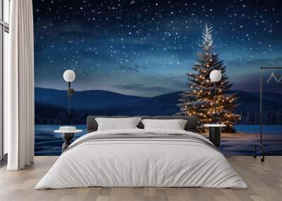 A majestic illuminated Christmas tree stands in a snowy meadow, surrounded by a dense pine forest under a starry night sky. Wall mural