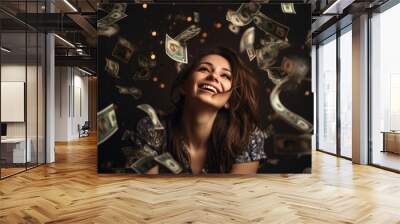 Attractive young woman stands under money fly rain. Wall mural