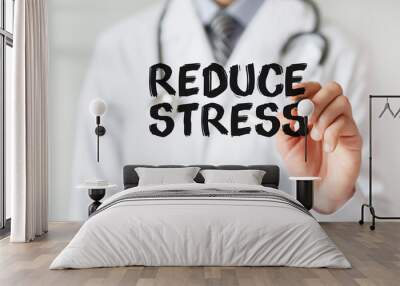 Doctor writing word Reduce Stress with marker, Medical concept Wall mural