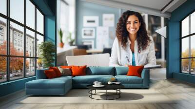 Happy professional female psychologist holding clipboard, looking and smiling at camera. Wall mural