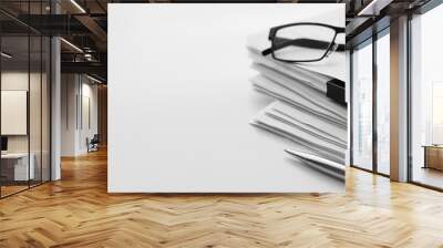 Stack of report paper documents with spectacles. Concept of business and financial data analysis research. Wall mural