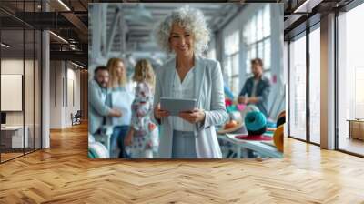 The businesswoman with tablet. Wall mural