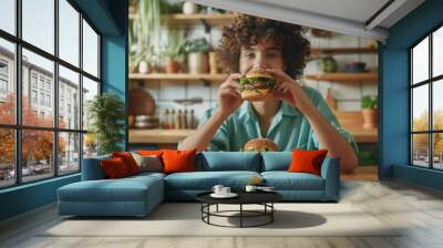 The woman eating burgers Wall mural