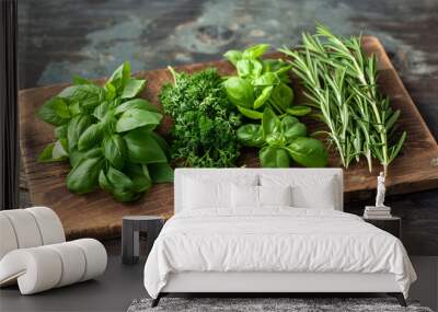 Variety of fresh herbs on a wooden cutting board Wall mural