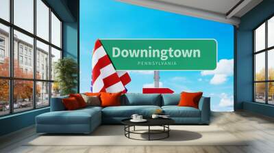 Downingtown – Pennsylvania. Road or Town Sign. Flag of the united states. Blue Sky. Red arrow shows the direction in the city. 3d rendering Wall mural