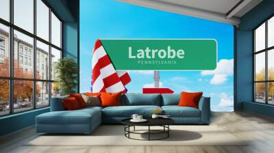 Latrobe – Pennsylvania. Road or Town Sign. Flag of the united states. Blue Sky. Red arrow shows the direction in the city. 3d rendering Wall mural