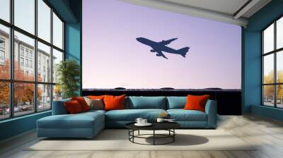 Airplane Taking Off At Sunset Wall mural