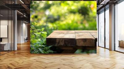 2. A rustic wooden podium in a vibrant garden, with a blurred backdrop of green foliage, providing an ideal setting for presenting organic products in a spring or summer theme Wall mural