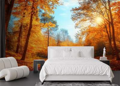 41. **A vibrant autumn forest with trees in full fall color and a carpet of leaves on the ground. The sky is clear, and the sunlight filters through the branches. Wall mural