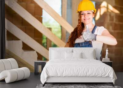 Smiling Woman Bricklayer Thumbs Up Wall mural