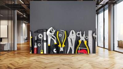 different tools and instruments for home renovation on grey desk Wall mural