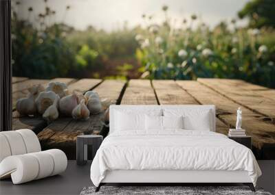 Garlic Field Tranquility: A Wooden Table, Empty with Abundant Copy Space, Placed over a Garlic Field Background, Eliciting Thoughts of Fresh Harvest and Agricultural Serenity.

 Wall mural