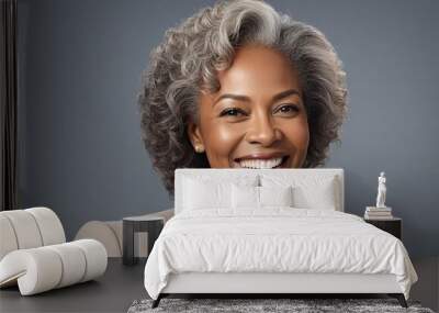 Portrait of happy middle aged confident african american businesswomen in 50s, smiling, looking at camera Wall mural