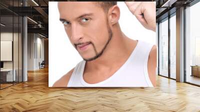 Man with perfect hair using comb brush Wall mural