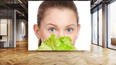 Young beauty woman with green lettuce Wall mural