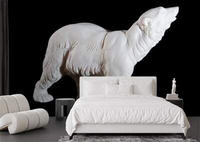 Classic white marble statuette of bear isolated on black Wall mural