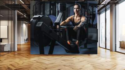 concept: power, strength, healthy lifestyle, sport. powerful attractive muscular woman crossfit trai Wall mural