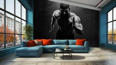 Muscular Men in Running Motion. Handsome Male Athlete Sprinting Wall mural