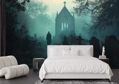 A lone figure walks towards a gothic chapel in a foggy graveyard Wall mural