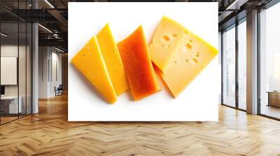 Yellow and orange cheese slices on a white background Wall mural