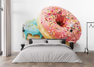 Three glazed donuts isolated on white background Wall mural