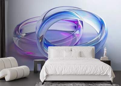 two intertwined glass rings with a reflective surface and colorful hues on a white background. Wall mural