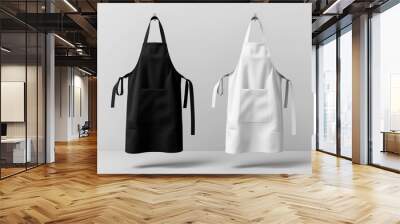 Modern a black and a white and aprons with shadow mockup isolated on on light gray background. Kitchen blank apron.with empty space for logo, text. Wall mural