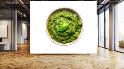 Fresh green spinach and basil pesto in a bowl top view isolated on transparent background Wall mural