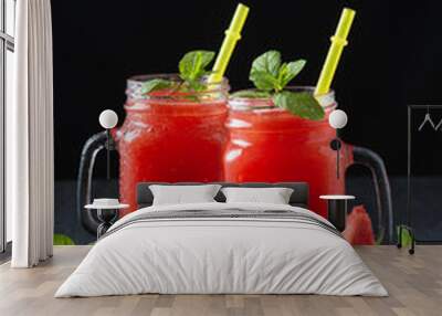 Cold watermelon juice and sliced watermelon. Wall mural