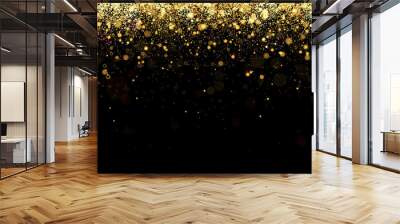 Festive vector background with gold glitter and confetti for christmas celebration. Black background with glowing golden particles. Wall mural