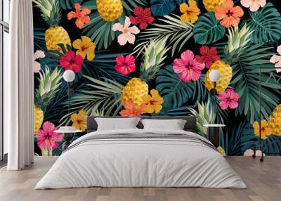 Seamless hand drawn tropical vector pattern with exotic palm leaves, hibiscus flowers, pineapples and various plants on dark background. Wall mural