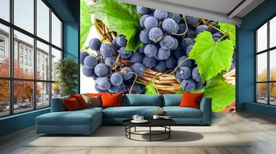 Ripe dark grapes with leaves, background  Wall mural