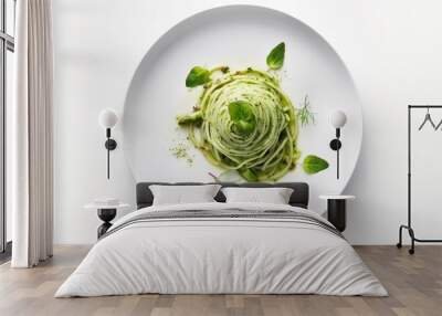 Traditional Italian spaghetti with asparagus in a herb sauce served as a top view on a Nordic design plate Wall mural