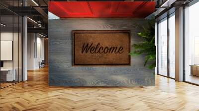 Overhead view of welcome mat outside inviting front door of house Wall mural