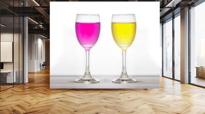 2 color alcohol drinks, yellow and pink And a reflection, set in the studio. Wall mural