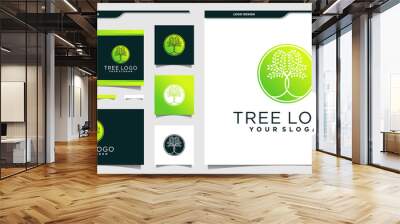 Tree logo with circle neagtive space concept and business card design Premium Vector Wall mural